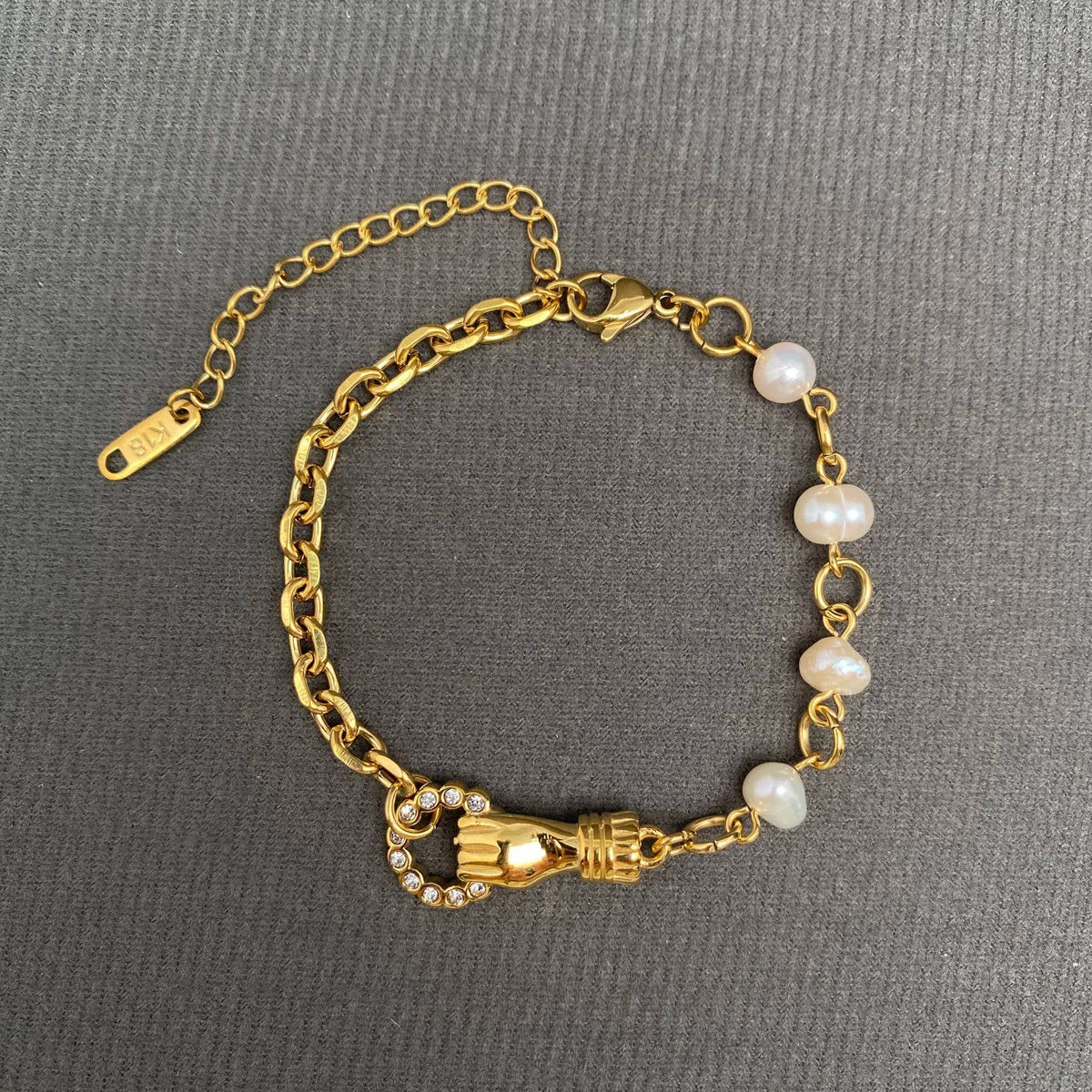Holding The Ring In Hand Bracelet