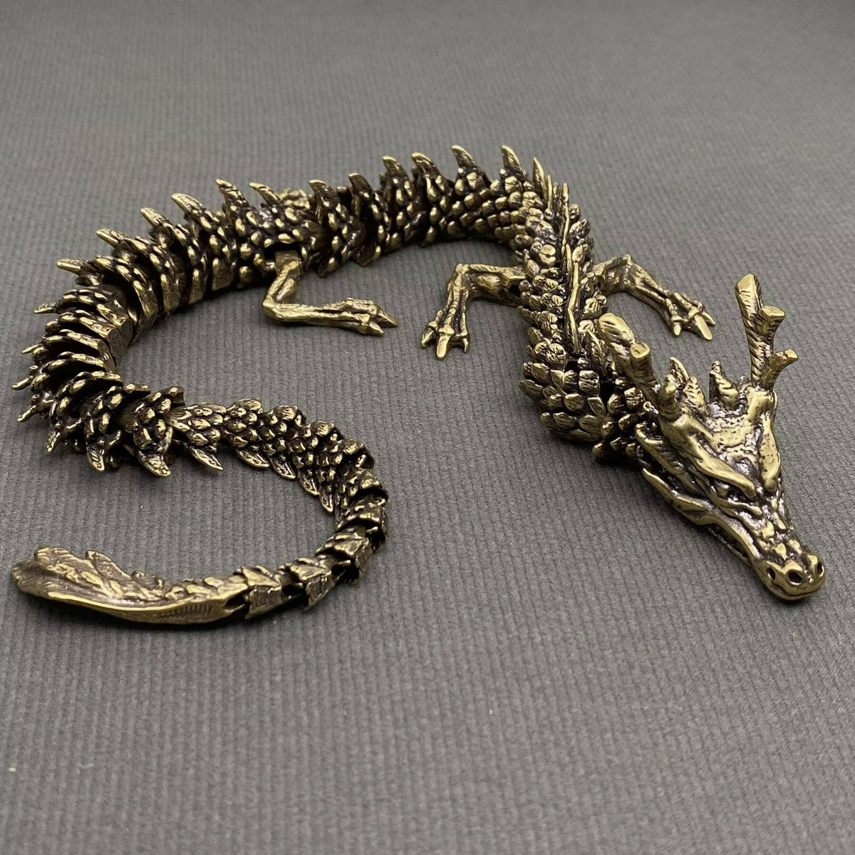 Moveable Brass Dragon